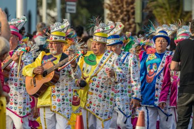 SANTA CRUZ DE TENERIFE, SPAIN - FEBRUARY 25, 2020: Coso parade - along the Avenida de Anaga, official end of Carnival. Again march carnival groups, floats, decorated cars and the Carnival Queens.
