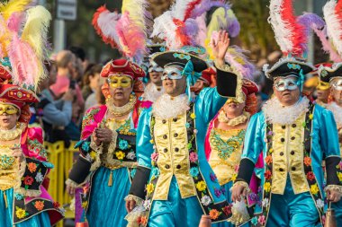 SANTA CRUZ DE TENERIFE, SPAIN - FEBRUARY 25, 2020: Coso parade - along the Avenida de Anaga, official end of Carnival. Again march carnival groups, floats, decorated cars and the Carnival Queens.