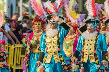SANTA CRUZ DE TENERIFE, SPAIN - FEBRUARY 25, 2020: Coso parade - along the Avenida de Anaga, official end of Carnival. Again march carnival groups, floats, decorated cars and the Carnival Queens.