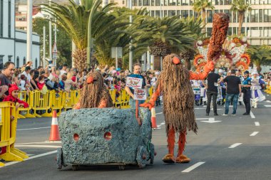 SANTA CRUZ DE TENERIFE, SPAIN - FEBRUARY 25, 2020: Coso parade - along the Avenida de Anaga, official end of Carnival. Again march carnival groups, floats, decorated cars and the Carnival Queens.