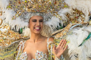 SANTA CRUZ DE TENERIFE, SPAIN - FEBRUARY 25, 2020: The Coso Parade - Final procession of the Carnival - second most popular and internationally known. One of the Carnival Queen candidate.