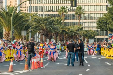 SANTA CRUZ DE TENERIFE, SPAIN - FEBRUARY 25, 2020: Coso parade - along the Avenida de Anaga, official end of Carnival. Again march carnival groups, floats, decorated cars and the Carnival Queens.
