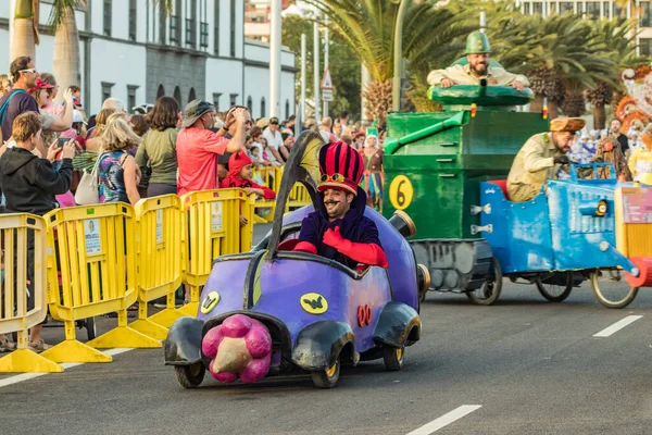 SANTA CRUZ DE TENERIFE, SPAIN - FEBRUARY 25, 2020: Coso parade - along the Avenida de Anaga, official end of Carnival. Again march carnival groups, floats, decorated cars and the Carnival Queens.