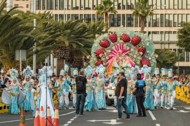 SANTA CRUZ DE TENERIFE, SPAIN - FEBRUARY 25, 2020: Coso parade - along the Avenida de Anaga, official end of Carnival. Again march carnival groups, floats, decorated cars and the Carnival Queens.