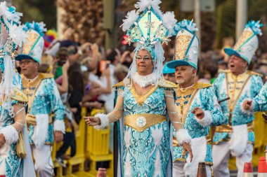 SANTA CRUZ DE TENERIFE, SPAIN - FEBRUARY 25, 2020: Coso parade - along the Avenida de Anaga, official end of Carnival. Again march carnival groups, floats, decorated cars and the Carnival Queens.