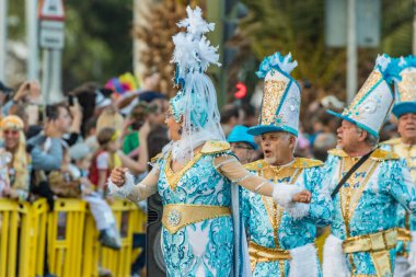 SANTA CRUZ DE TENERIFE, SPAIN - FEBRUARY 25, 2020: Coso parade - along the Avenida de Anaga, official end of Carnival. Again march carnival groups, floats, decorated cars and the Carnival Queens.