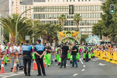 SANTA CRUZ DE TENERIFE, SPAIN - FEBRUARY 25, 2020: Coso parade - along the Avenida de Anaga, official end of Carnival. Again march carnival groups, floats, decorated cars and the Carnival Queens.