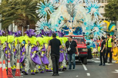 SANTA CRUZ DE TENERIFE, SPAIN - FEBRUARY 25, 2020: The Coso Parade - Final procession of the Carnival - second most popular and internationally known. One of the Carnival Queen candidate.