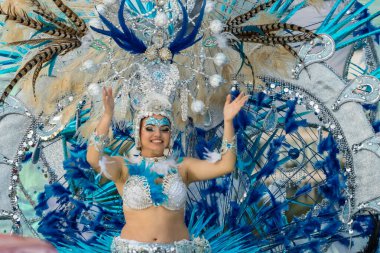 SANTA CRUZ DE TENERIFE, SPAIN - FEBRUARY 25, 2020: The Coso Parade - Final procession of the Carnival - second most popular and internationally known. One of the Carnival Queen candidate.