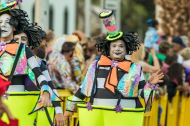 SANTA CRUZ DE TENERIFE, SPAIN - FEBRUARY 25, 2020: Coso parade - along the Avenida de Anaga, official end of Carnival. Again march carnival groups, floats, decorated cars and the Carnival Queens.