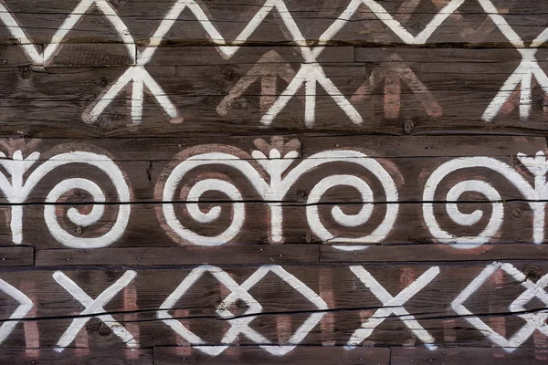 Close view of decoration of log houses used in village of Cicmany. — Stock Photo, Image