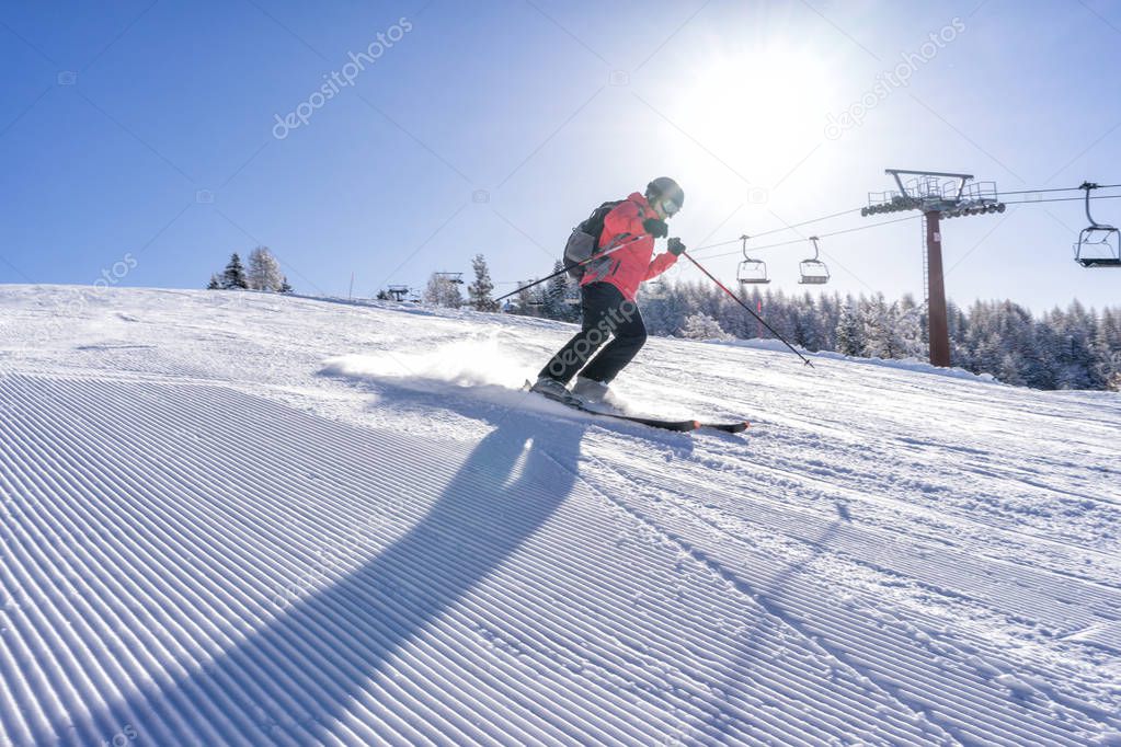 Female skier on italien slopes.