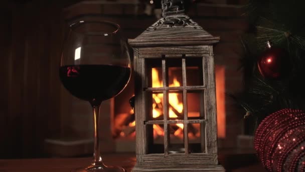 Glass Red Wine Old Wooden Candlestick Background Burning Fire Christmas — Stock Video