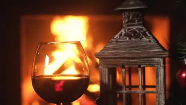 Glass Red Wine Old Wooden Candlestick Background Burning Fire Christmas — Stock Video
