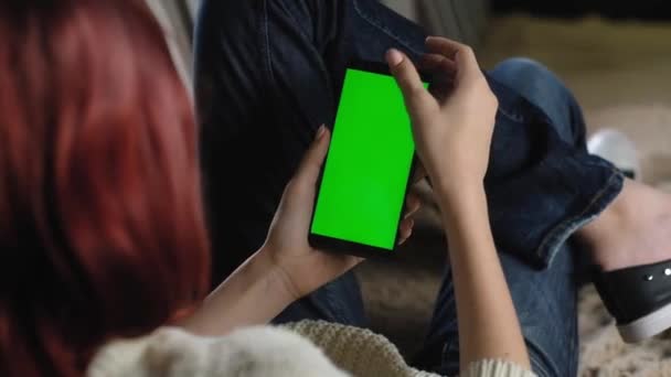 Woman Flips Photos Finger Gesture Using Her Green Screen Phone — Stock Video