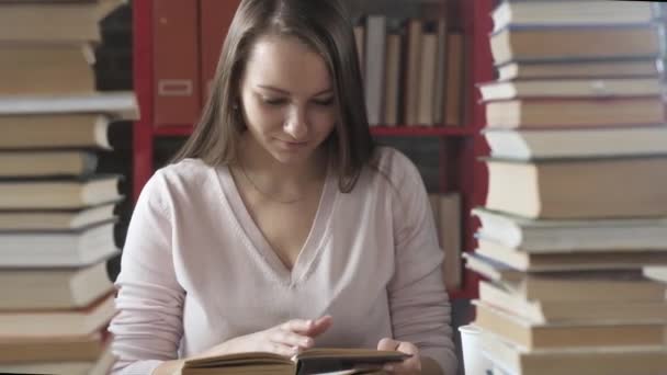 Cute Student Reads Books Portrait Beautiful Young Girl Sitting Library — Stock Video