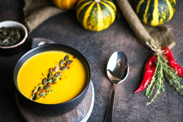 Homemade Pumpkin Cream Soup Seeds Spices Herbs Dark Background Top — Stock Photo, Image