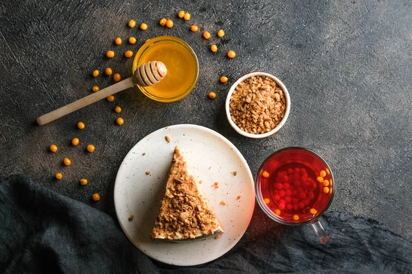 Homemade honey cake on a dark background top view copy space.