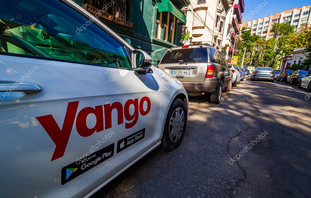 Bucharest, Romania - September 09, 2019: A car with the Yango logo of the multinational Yandex.Taxi BV belonging to Russian multinational corporation Yandex N.V. is parked on a street in Bucharest.