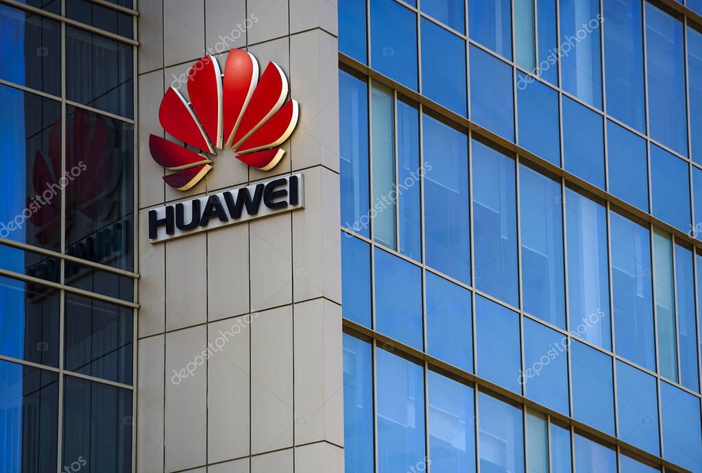 Bucharest, Romania -  April 08, 2020: A logo of Huawei, Chinese telecommunications equipment company, is displayed on the top of a building, in Bucharest, Romania.