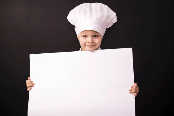 Zabawny kucharz trzyma papieru — Zdjęcie stockowe