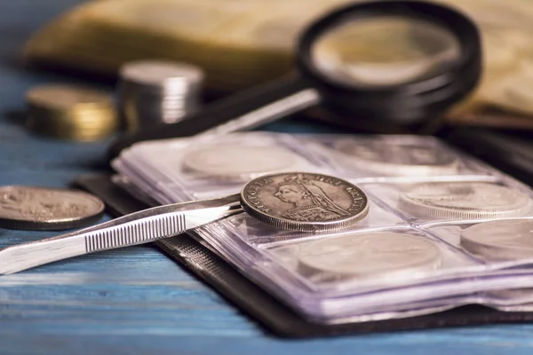 Collecting old valuable coins — Stock Photo, Image