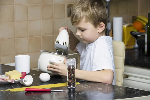 Cute Boy Prepares Carbonara Sauce Paste Ingredients Kitchen — Stock Photo, Image