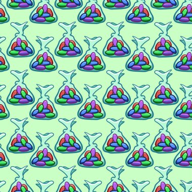 Yeşil arka planda şeffaf ambalajsız şekerlemeler.