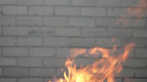 Fire Burns Brick Wall Background — Stock Video