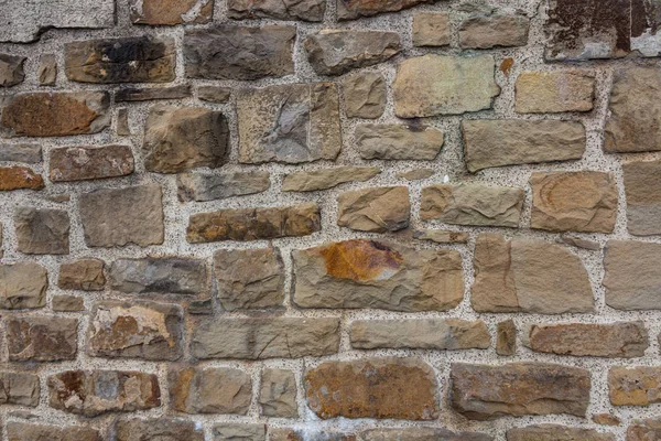 Motif couleur grise de style moderne design décoratif inégale fissuré surface de mur de pierre véritable avec du ciment — Photo