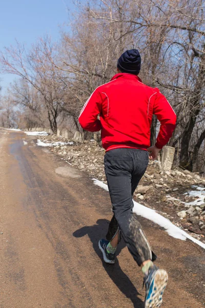 Outdoor cross-country running in early sunrise concept for exercising, fitness and healthy lifestyle