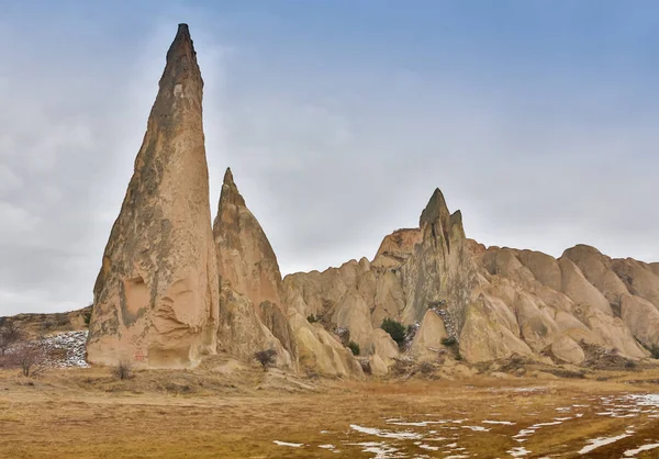 The sharp cones of rock formations boasts unique colors and shapes, Cappadocia, Turkey. — Stock Photo, Image