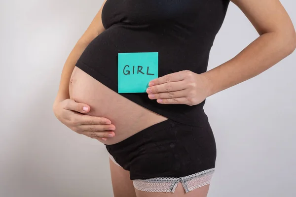 Mujer embarazada esperando a un niño o niña — Foto de Stock