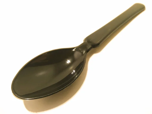 Picture Empty Black Spoon — Stock Photo, Image