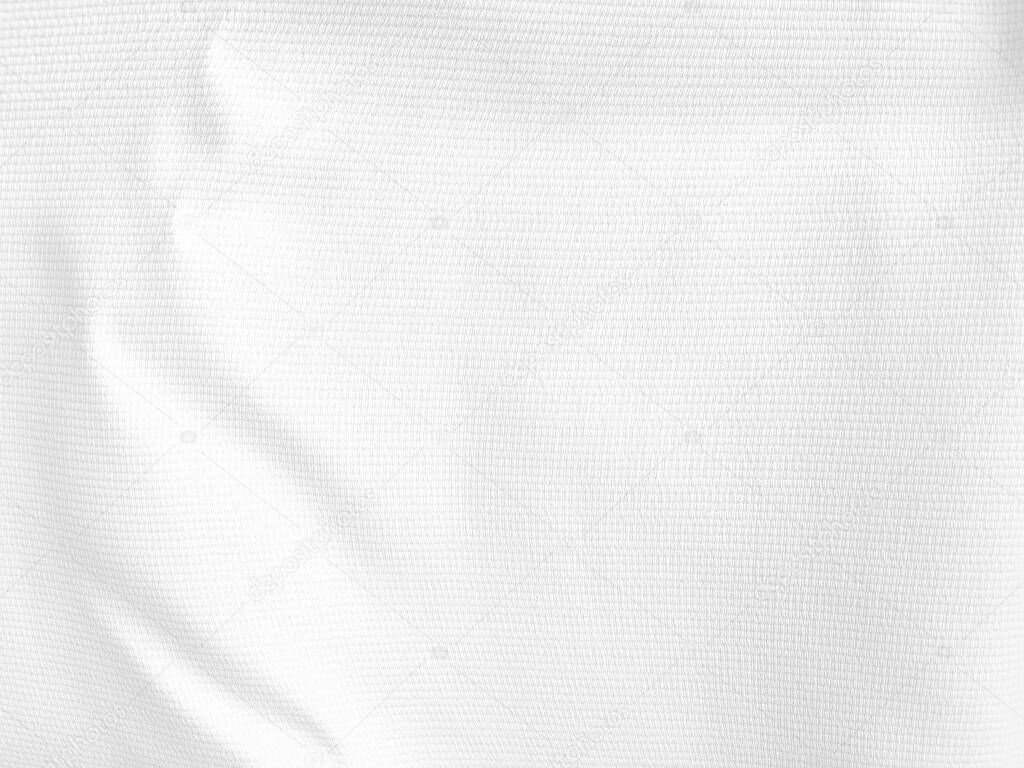 Soft white wrinkled fabric background for graphic design or wallpaper.