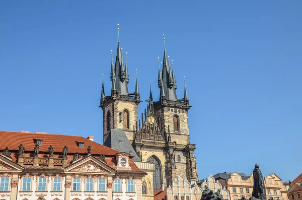 Historical buildings in the old town with the front side of the Church of Our Lady before Tyn in Prague, Czech Republic. Old Town Square in Praha, Czechia. Tourist landmarks. Horizontal photo.