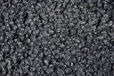 Soyut doku arka planı, koyu taş duvar, taze asfalt