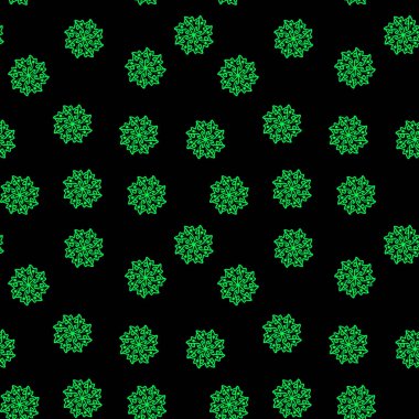 Noel 'de siyah arka planda yeşil, pürüzsüz kar taneleri.