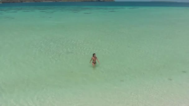 Cinematic Aerial View Woman Alone Isolated White Sandbar Onok Island — Stock Video