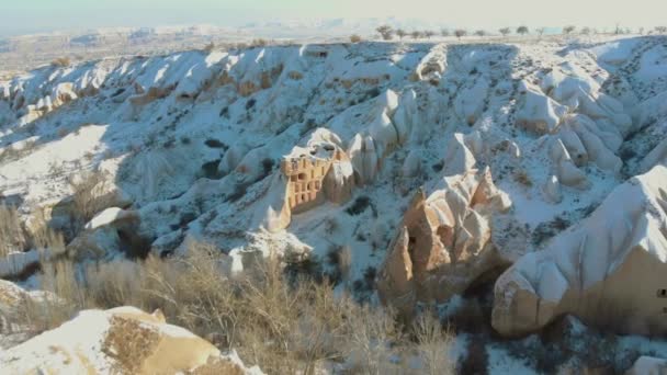 Aerial View Pigeon Valley Cave Houses Covered Snow Sunrise Cappadocia — Stock Video