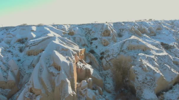 Aerial View Pigeon Valley Cave Houses Covered Snow Sunrise Cappadocia — Stock Video