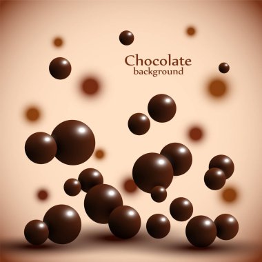 Arka plan üzerinde koyu çikolata topları.