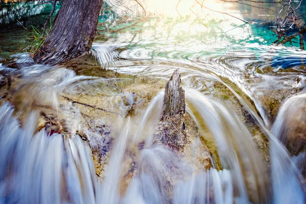 Autumn view of the small waterfall with pure water at sunset. — Stock Photo, Image