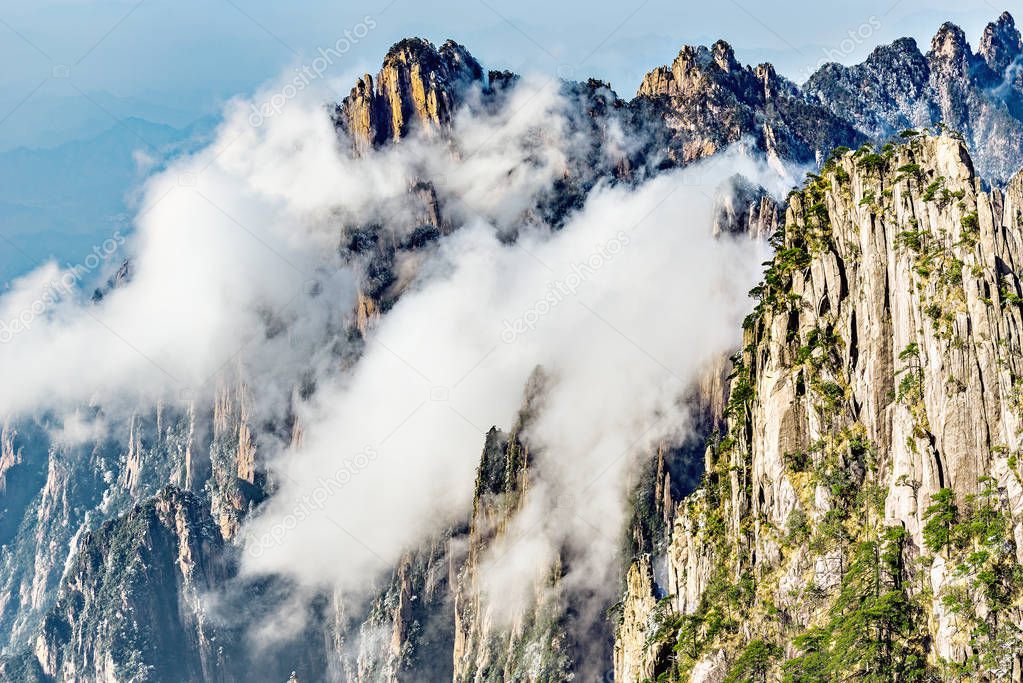 Clouds above the mountain peaks.