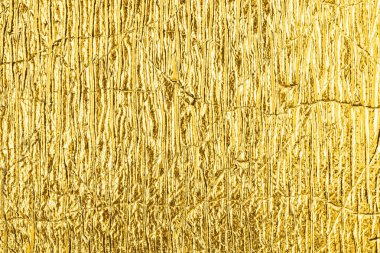 Altın folyo dokulu arka plan.