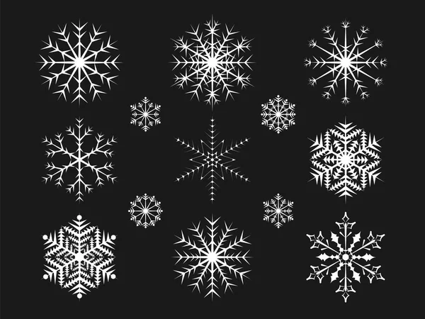 Flocos de neve de Natal em um fundo preto . —  Vetores de Stock