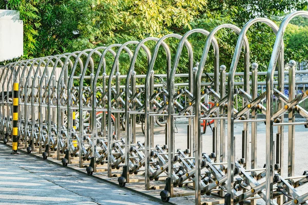 Metal fence by the stadium entrance at day time. — Stock Photo, Image