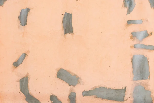 ピンクの壁の質感の背景に石膏 — ストック写真