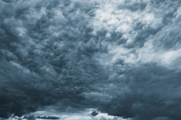 Dark storm clouds before rain at evening time.