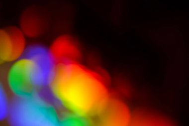 soyut bulanık renkli parlak ampuller arka planda.